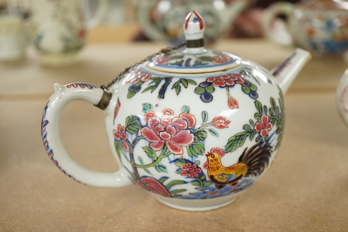 Three 18th century Chinese porcelain European enamelled teapots and covers, tallest - 13cm high